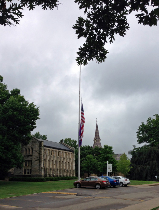 Flags hang at half mast at Kenyon College in honor of student Andrew Pochter, killed during a street protest in Egypt.