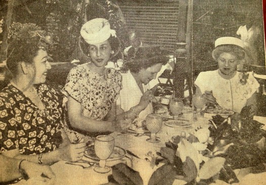 Naomi Marshall chats with the wife of the president of Costa Rica at a luncheon during the inauguration of New Orleans mayor Chep Morrison in 1946.
