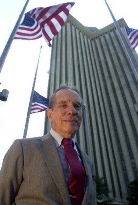 World Trade Center Association founder Paul Fabry poses defiantly in front of the WTC tower just days September 11, 2001. (Photo by G.Andrew Boyd, nola.com)