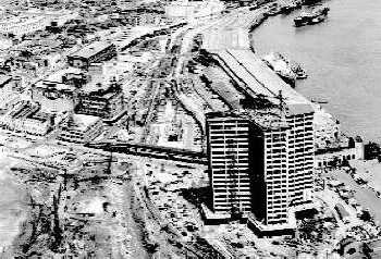 WTC tower under construction, showing undeveloped surroundings in the 1960s.