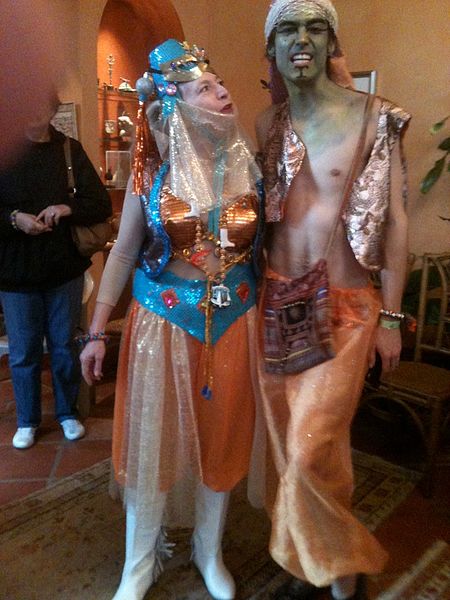Get costume ready, like this Harem couple at Krewe du Vieux 2012, before the parade at King Pin.