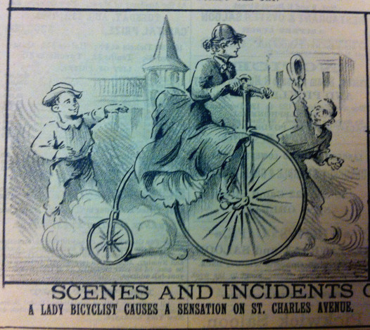 Cartoon, "The Mascot", New Orleans, 27 July 1891. "Scenes and Incidents - A Lady Bicyclist Creates a Sensation on St. Charles Avenue".