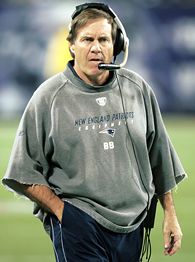 New England Patriots head coach Bill Belichick sporting his signature cut-off sweatshirt 