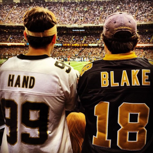 Saints jersey statements back in 2000: wearing defensive tackle Norman Hand and quarterback Jeff Blake.