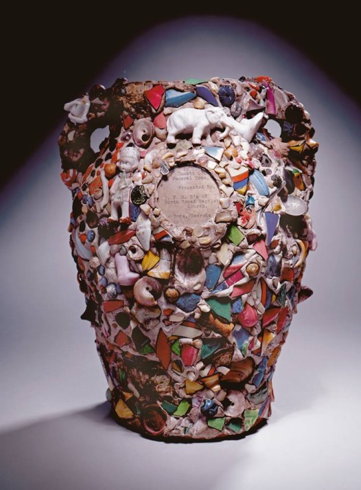 One of the pieces from NOMA's 'Kongo Across the Waters' exhibition, “Memory jars” were a Kongo-inspired art form, typically created to honor the dead. Decorated with bits and pieces from possessions of the deceased, these jars were often used as grave-markers. (Photo: American, Memory jar, 20th century, High Museum of Art)