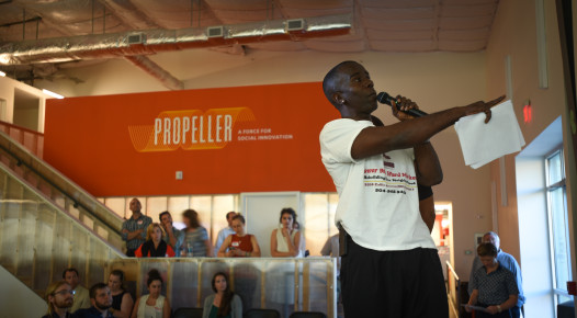 Lower Ninth Ward Market co-founder Burnell Cotlon pitching on stage at Propeller's PitchNOLA: Living Well competition. (photo: Chet Overall)