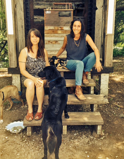 Airlift's Tori Bush and Delaney Martin hang out with four-footed friends in Shake House, by Martin and Airlift co-founder Taylor Lee Shepherd. (Photo: Renee Peck)