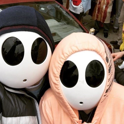 Shy Guy masks work double duty for a crowd-challenged Mardi Gras neophyte.