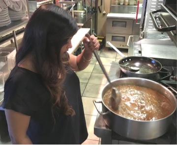 Pranita stirs a pot of Indian gumbo. (Photos by Carol Pulitzer)