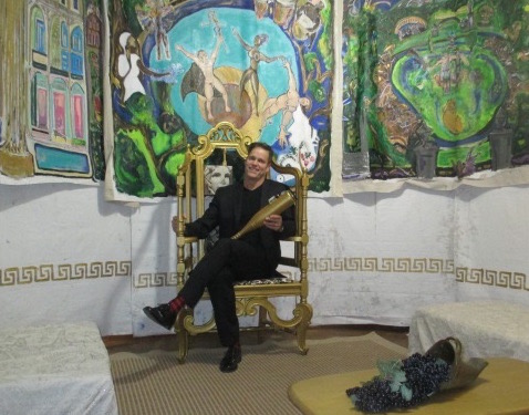 Morgan Molthrop enjoying his artwork in Alexander's campaign tent.