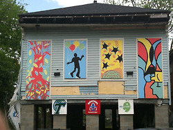 Hoffman Triangle houses are boarded up -- prettily, for now, thanks to United Saints and KidsmART.