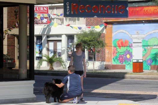 Trainer Zak George getting Emma ready for her shot outside Cafe Reconcile
