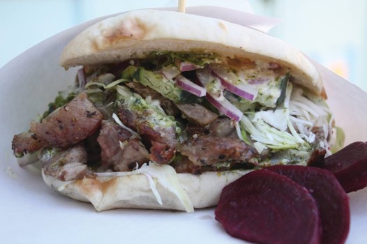 The rotisserie pork Doner Kebab sandwich and beet fries. 