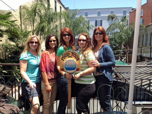 Foodie tourists take a tasting trek through the city. (Photo by Lynne Wasserman)