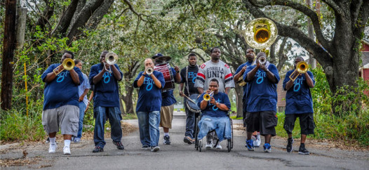 Terrell Batiste rolls with the Hot 8. 'If you ask any young brass player who they look up to, they'll say the Hot 8,' says Batiste. He certainly did.