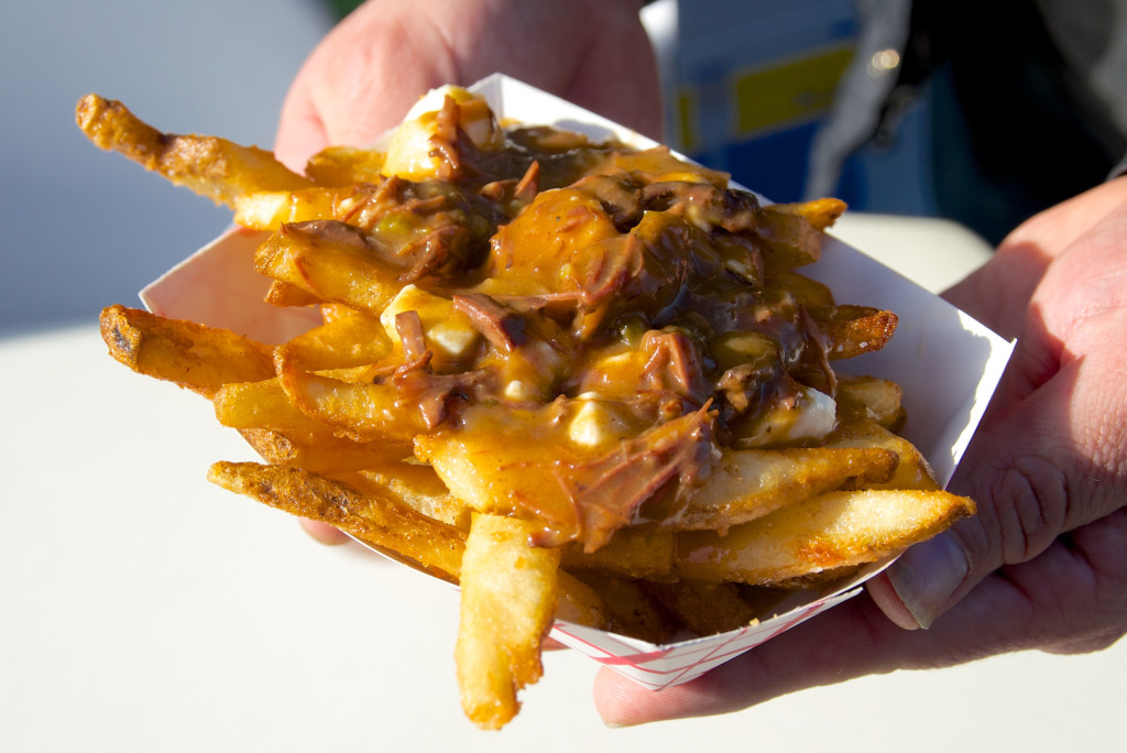 French fries with cheese curds and hot roast beef gravy? Hat tip to you, Canada.