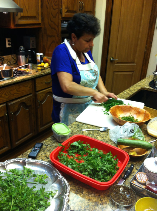 Kamari Suleiman chops parsley for a Middle Eastern meal. (Photo: Carol Pulitzer)