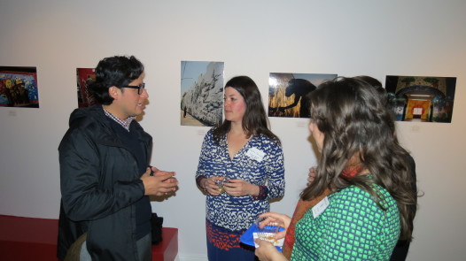 Mexican mural/graffiti artist Emmanuel Audelo Enriquez during a reception at the Mexican Consulate speaking with NODC members and board members. Photo: NODC