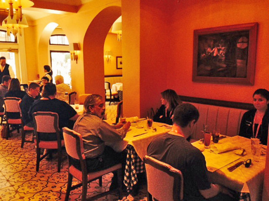 Downstairs dining room now has windows overlooking Royal Street.