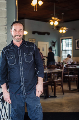 Mark Robertson, who works the bar at Horn’s, keeping on eye on the cafe tables outside. (Photo: Steve Sespehar)