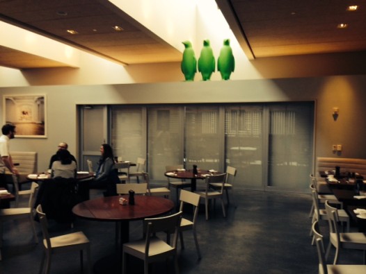 The Hive restaurant, with green penguins overhead