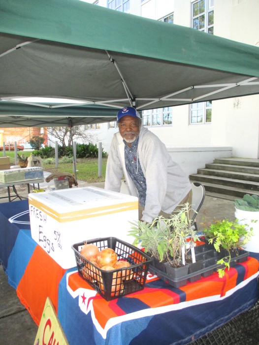 Calvin Alexander sells produce at the St. Claude Avenue farmers market.