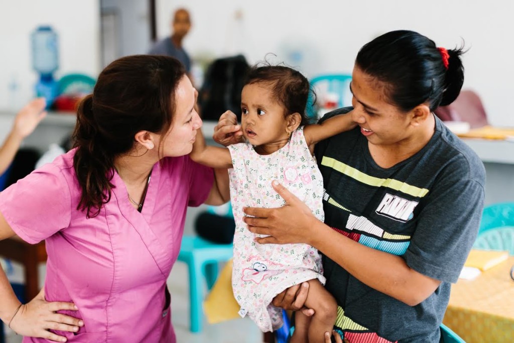 Indie rock vocalist-turned-nurse Yanti Turang, shown here in Indonesia, started LearnToLive after realizing the chasm between first and third world resources. (Photo: LearnToLive)