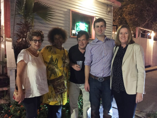 Travis Menard, second from right, introducers explorers to 'Smokin' Seafood.' (Photo: FUHWE.com)
