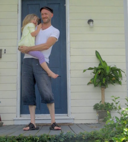 Mathilda and Robert on the front porch of their 19th century Creole cottage.