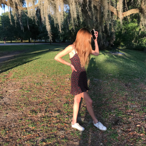 Person in front of the Tree of Life